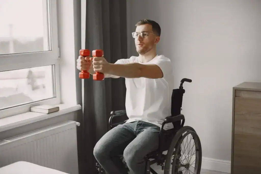 Empowering Weight Loss: A Comprehensive Guide for Individuals with Disabilities 1 Image of man doing exercise in his wheelchair to aid weight loss Devizes