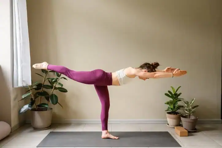 Achieving the Perfect Tone: How Often Should You Exercise for Results? 1 Woman doing Yoga exercise Devizes to help with toning the body.