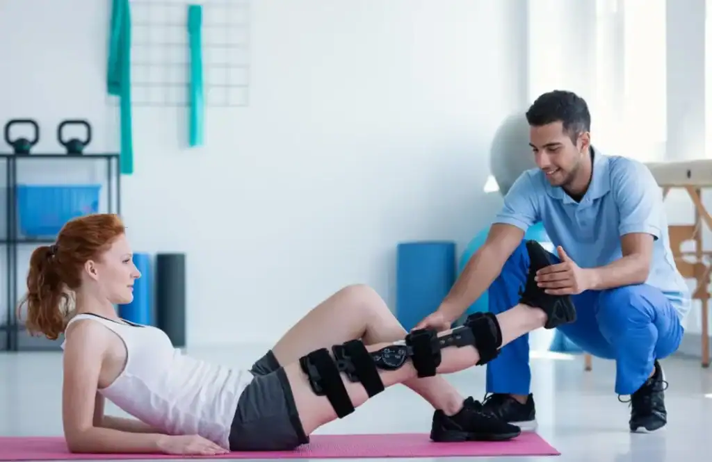 Woman having treatment to help muscle recovery Devizes after an injury